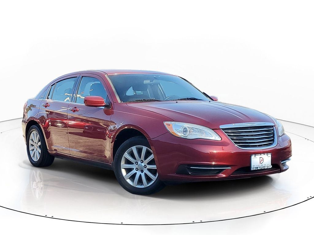 2013 Chrysler 200 Touring in Deep Cherry Red Crystal Pearlcoat — front three-quarter view