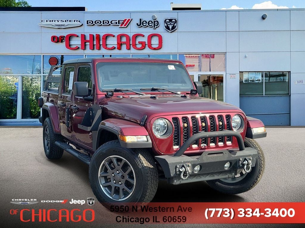 2021 Jeep Gladiator Sport in Snazzberry Pearlcoat — front three-quarter view