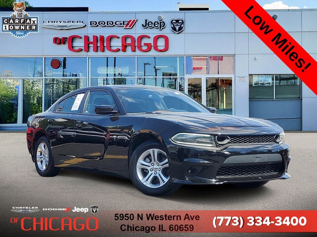 2022 Dodge Charger SXT in Pitch Black Clearcoat — front three-quarter view