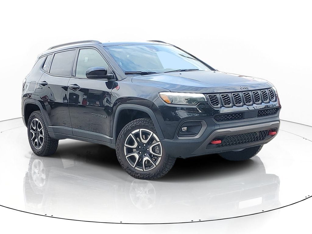 2024 Jeep Compass Trailhawk in Diamond Black Crystal Pearlcoat — front three-quarter view