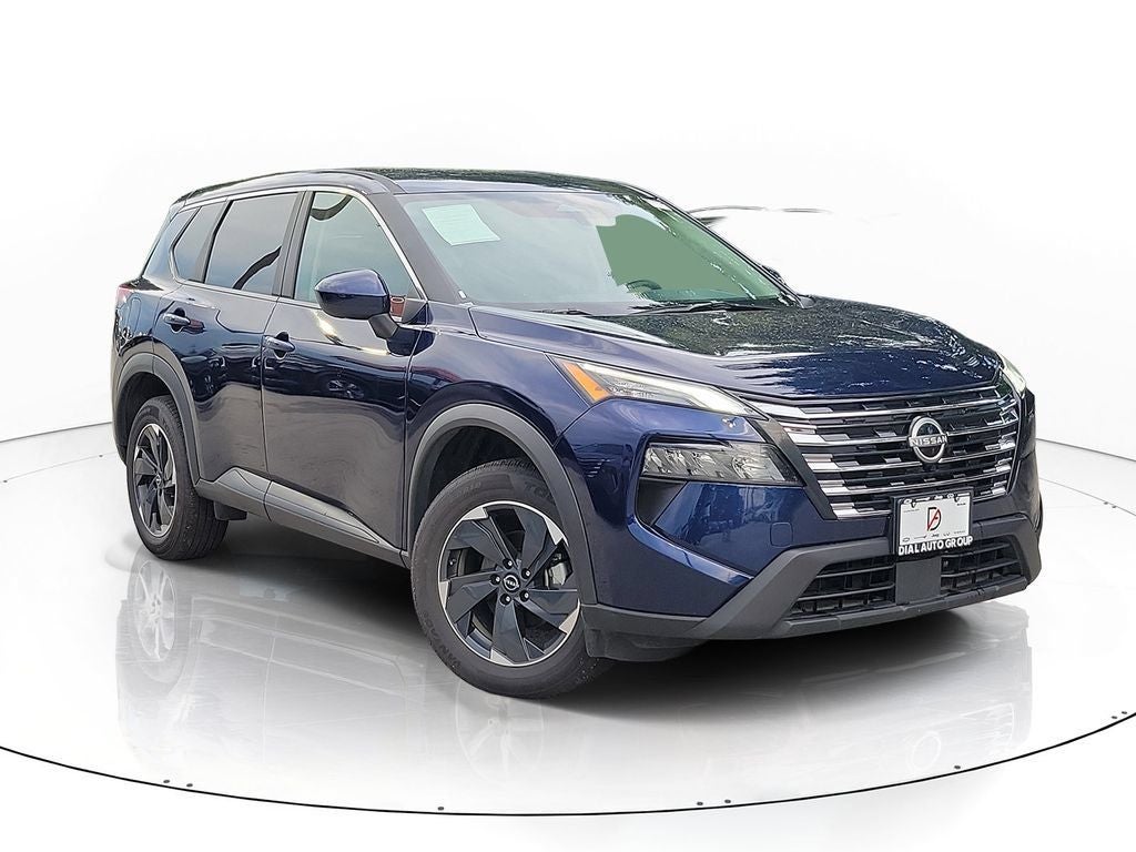 2025 Nissan Rogue SV in Deep Ocean Blue Pearl — front three-quarter view