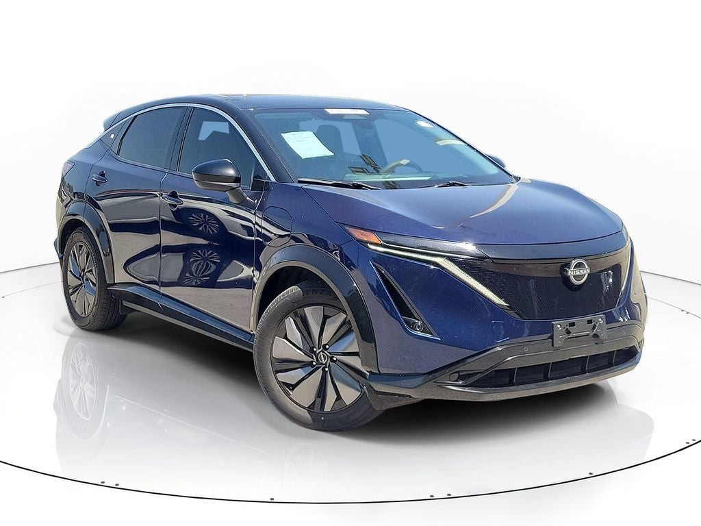 2023 Nissan Ariya ENGAGE in Deep Ocean Blue Pearl/Black Diamond Pearl — front three-quarter view